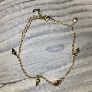 Gold MVMT bracelet